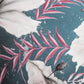 Tissue paper with a tropical floral print design, including various flowers and foliage in shades of pink, white, and green on a dark background.