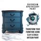 a small side table painted in a blue gray paint 